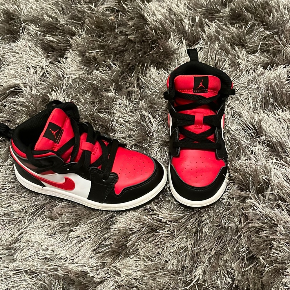Red, white and black Air Jordan’s